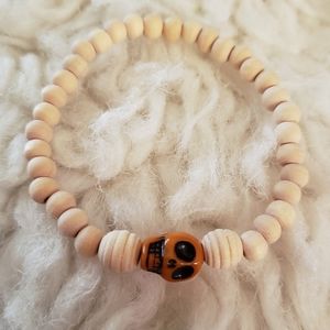 Orange Skull And Wood Beaded Bracelet